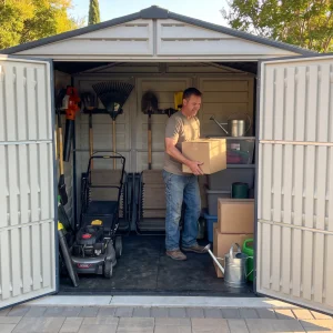 Duramax Ridgeline 8x6 vinyl shed with wide double-door access for outdoor storage