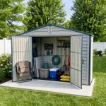 RidgeLine 10.5' x 3' shed open on a concrete pad with gardening tools and outdoor supplies inside