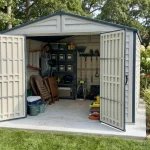 RidgeLine 10.5 x 10.5 shed with double doors open showing organized lawn and outdoor gear storage