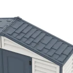 Close-up of the Duramax RidgeLine dark grey shingle-style roof panels and trim
